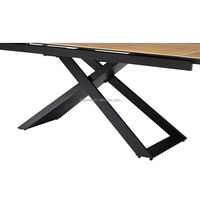 Table de salle à manger à deux fonctions d'extension à usage domestique en céramique et fond en verre comme pied de table supérieur est une plaque de métal noire