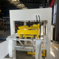 Système d'alimentation automatique de palettes pour machine à blocs, pour ligne de production de briques en béton