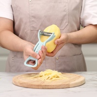 Multifunctionele 4-in-1 schilmes, snijder, flesopener en kruidenstripper, julienne groenteschiller, aardappelschiller