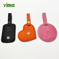 Étiquettes en cuir PU personnalisées avec logo gaufré et découpé en cuir de vachette pour vêtements de fabricant, idéales pour jeans et confection
