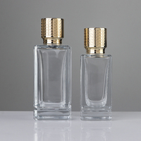 Flacon de parfum en verre de luxe ODM à fond épais, 50 ml, 100 ml, coloré, bleu foncé, ambre, rose, avec bouchon en zamac doré