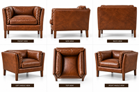 Fauteuil lounge vintage en cuir marron traditionnel avec coussin de dossier ergonomique, accoudoirs incurvés et un attrait intemporel pour la maison