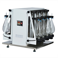 Équipement de laboratoire haute fréquence pour le mélange et la séparation verticaux de liquides chimiques, avec agitateur à entonnoir.