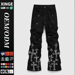 Pantalones vaqueros Y2K holgados para hombre, estilo vintage lavado y desgastado, con estampado gráfico de cruz personalizado y pedrería, de pierna ancha, de fabricante de ropa urbana. - Product Image 1