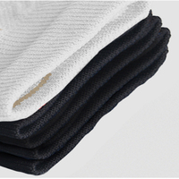 Chaussettes antidérapantes pour le sport et la course à pied pour les jeunes Chaussettes de basket-ball et de football antidérapantes personnalisées avec logo en bas