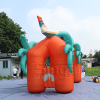 Arche gonflable géante personnalisée en forme de palmier tropical et d'avion pour les expositions, les spectacles et les événements promotionnels