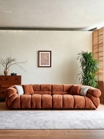 Canapé une place en tissu chenille, design épuré, couleur crème, style Wabi-sabi moderne, idéal pour salon haut de gamme ou petit appartement