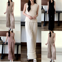 Ensemble décontracté deux pièces plissé minimaliste OEM d'usine, style Dubaï, couleur lavande unie, avec cardigan à franges et jupe midi