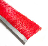 Brosse à bandes pour machine à blocs de béton