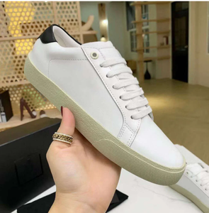 รองเท้าผ้าใบหนังคลาสสิค Court Classic SL/06 สีขาวดำ - Product Image 4