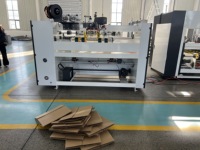 Machine à coudre les cartons en une seule pièce / Couseuse de cartons monobloc
