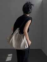 Sac de voyage léger en toile grande capacité avec cordon de serrage, style tendance urbaine pour porté en bandoulière