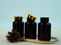 Conteneur de pilules pour animaux de compagnie 150ML bouchon doré bouteilles en plastique vides emballage de capsules pour produits de santé pilules