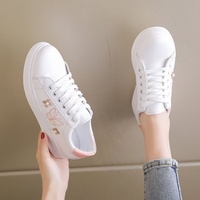 Baskets blanches pour femmes Printemps-Été 2026 Nouveauté à lacets décontractées semelles souples chaussures de course chaussures d'étudiant motif floral empeigne en PU maille