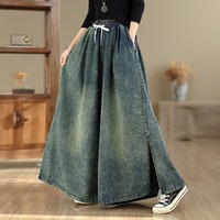 Nouvelle collection automne 2026 – Jean ample taille haute délavé bleu, coupe artistique minimaliste, jambe large fendue, longueur complète, décontracté et chic pour femme
