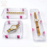 Boîte de présentation transparente 200x100x50mm avec boucle rose personnalisable, adaptée aux bijoux et aux montres