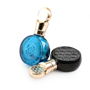 Vente <span class=keywords><strong>en</strong></span> <span class=keywords><strong>gros</strong></span> de flacons de parfum ronds <span class=keywords><strong>en</strong></span> verre personnalisés de 50 ml, emballages de parfum vides colorés avec bouchon doré - Product Image 4