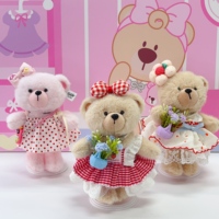Teddy ISLAND Ours en peluche sous licence mondiale avec chapeau de fête étoilé à carreaux verts et robe en dentelle à carreaux bleus