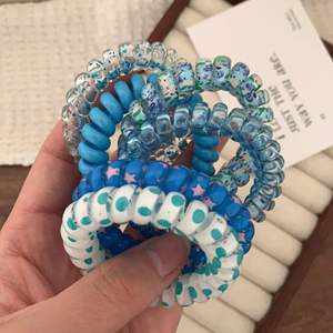 Attaches à <span class=keywords><strong>cheveux</strong></span> en fil de téléphone en silicone avec bobine bouclée de créateur attaches à <span class=keywords><strong>cheveux</strong></span> en <span class=keywords><strong>spirale</strong></span> pour enfants coréens mignons élastiques en plastique pour <span class=keywords><strong>cheveux</strong></span> de filles - Product Image 3