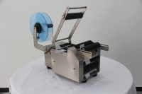 Machine d'étiquetage de bouteilles rondes semi-automatique LT-50s pour les canettes, les bocaux, les bouteilles en plastique, en verre, en métal