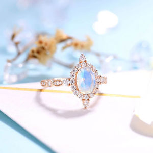 แหวนหมั้นเงินแท้ 925 ชุบทองคำสีโรสโกลด์ ประดับด้วยมูนสโตนสีน้ำเงินทรงรี รุ่นใหม่ล่าสุด - Product Image 4