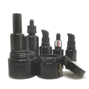 Vente en gros de pots en verre cosmétiques ronds noirs uniques avec couvercles en plastique, emballages personnalisés de luxe pour beurre corporel, 1 oz, 2 oz, 120 ml, 250 ml, 500 ml - Product Image 6