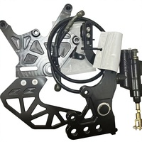 Großhandel Surron Light Bee X Segway X260 LBX Doppel-Bremssattel Hinterer Fußhalterungssatz CNC Verstärktes Aluminium Stunt Schneller Versand