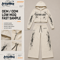Ensemble décontracté pour homme personnalisé avec haut zippé à motif éclaboussures de peinture crème et garniture à clous colorés, et pantalon large – OEM ODM