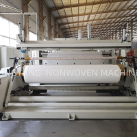 Ligne de production non tissée collée à travers l'air pour couches pour bébés serviette hygiénique féminine air chaud à travers la machine à carder