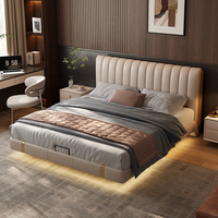 Lit en cuir véritable de luxe, mobilier de chambre à coucher moderne et intelligent avec éclairage d'ambiance LED, lit flottant capitonné taille King