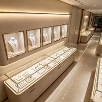 Grande vitrine à bijoux en bois gris foncé avec éclairage LED, design écologique, construction durable pour l'affichage en magasin de bijouterie