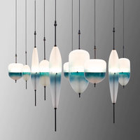Lustre américain de luxe en verre d'art moderne bleu blanc chaud blanc plafonnier suspendu avec forme ovale pour restaurants