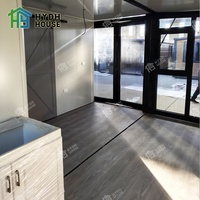 Maison en conteneur extensible à double aile de 20 pieds avec fenêtre du sol au plafond Espace de vie personnalisable