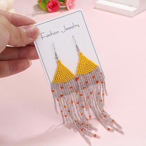 Boucles d'oreilles tissées Style bohème longue frange couleur perles de riz boucles d'oreilles pour femmes Uionen 1846 - Product Image 4