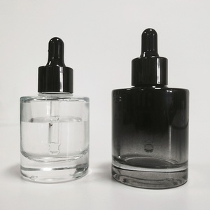 Luxury Skin Care Flat Shoulder Glass <b>Dropper</b> <b>Bottle</b> 30ml 50ml Custom Color Silk Screen Essential Oil <b>Bottle</b> with <b>Dropper</b> Cap - Product Image 1