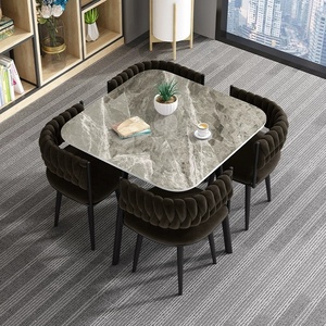 Ensemble de table à manger ronde en pierre frittée de qualité supérieure avec quatre chaises ergonomiques en métal pour salon moderne et espaces commerciaux - Product Image 1