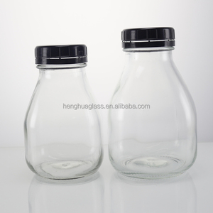 Haute fabrication 330ml <span class=keywords><strong>33cl</strong></span> 11oz bouteille de lait en <span class=keywords><strong>verre</strong></span> carré transparent pour boisson de jus de lait à boire avec bouchon en <span class=keywords><strong>plastique</strong></span> inviolable - Product Image 1