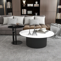 Table basse ronde moderne et simple avec plateau en marbre pour salon et hôtel, durable et facile à nettoyer