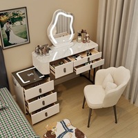 Coiffeuse en bois massif moderne et minimaliste pour chambre à coucher, avec tiroirs de rangement intégrés, miroir en forme de nuage et fonction maquillage sans fil