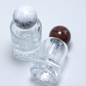 Luxury 50ml Round Glass Perfume Bottle with Resin <b>Cap</b> Hot Stamping <b>Mountain</b> Bottom Unique Perfume Bottle - Product Image 2