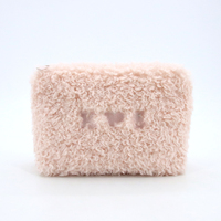 Pochette de voyage en fausse fourrure pelucheuse avec fermeture éclair pour le rangement des cosmétiques
