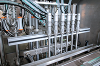Machine de remplissage de liquides multi-têtes à pompe à piston automatique, idéale pour le lait, le vin et l'eau potable