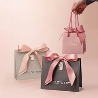 Sac en papier réutilisable avec fermeture à nœud pour les courses, les cadeaux et les bijoux