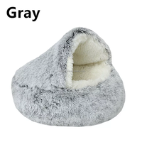Vente en gros d'usine OEM lit pour chat grotte lit rond en peluche moelleux à capuche pour chien beignet auto-chaud maison pour animaux de compagnie lit apaisant nid de chenil de couchage
