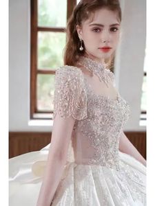 NDB10403 フランス製レースのメインウェディングドレス 年末年始の新婦用メインヤーン 小さな重厚感のある手作りの高級大型ロングテール - Product Image 4
