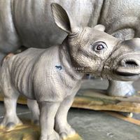 Modèle d'animal animatronique de rhinocéros blanc pour la décoration de parc de vulgarisation scientifique de la connaissance naturelle, 1 paire