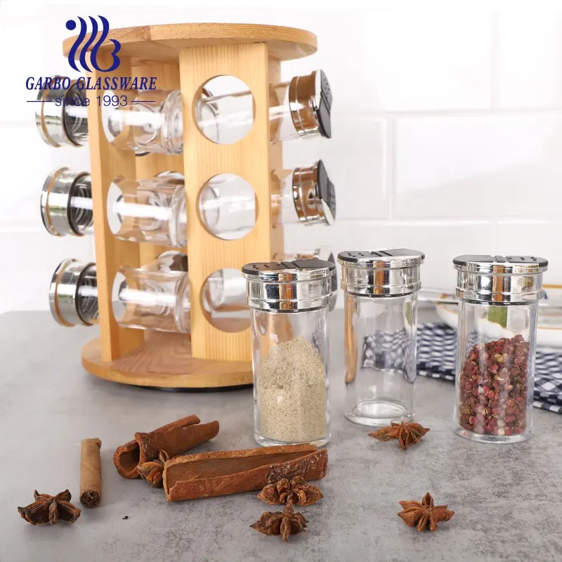 Beaux ensembles de pots de stockage d'épices en verre d'ustensiles de cuisine avec étagère de présentation en bois 13 pots de bouteille d'épices de condiment en verre avec couvercle