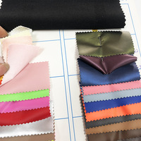 Tissu en cuir PU extensible quatre directions ultra-fin de 0,5 mm, tissage uni doux pour bagages et boîtes cadeaux