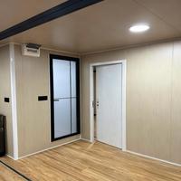 Maison conteneur de 40 pieds - Conception de villa modulaire en panneaux sandwich d'acier, aménagement moderne avec deux chambres et un salon