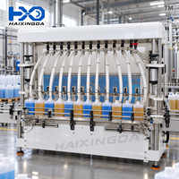 Machine de remplissage automatique de liquides chimiques par gravité à 12 buses en ligne pour bouteilles, idéale pour les acides, les eaux de Javel et les systèmes de nettoyage industriels